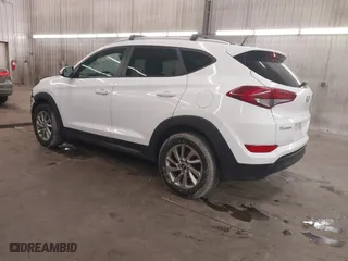 2016 Hyundai Tucson SE with VIN KM8J33A48GU117807, listed as a IAAI auction lot 41642891 with 142,371 mi miles. Bid and sale history available at carsss.com. Image 3.
