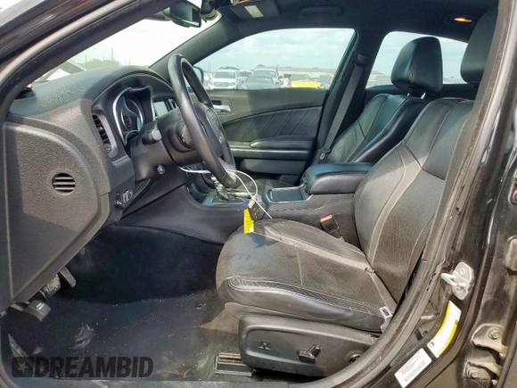 2015 Dodge Charger SXT with VIN 2C3CDXHG7FH721825, listed as a Copart auction lot 58076255 with 193,740 mi miles and Salvage title. Bid and sale history available at DreamBid. Image 7.