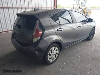 2015 Toyota Prius c One with VIN JTDKDTB38F1115180, listed as a IAAI auction lot 41875654 with 227,356 mi miles. Bid and sale history available at carsss.com. Image 4.