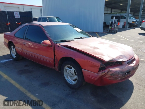 1996 Ford Thunderbird LX z VIN 1FALP62W0TH142986, wystawiony jako IAAI lot #42030900 z przebiegiem 168 993 mil mil oraz . Historia ofert i sprzedaży dostępna na DreamBid. Obrazek 1.