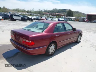 2000 Mercedes-Benz E-Class with VIN WDBJF65J1YB018240, listed as a IAAI auction lot 42051187 with 186,651 mi miles. Bid and sale history available at carsss.com. Image 4.