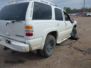 2003 Chevrolet Tahoe LT with VIN 1GNEK13Z53R121923, listed as a IAAI auction lot 41590696 with 1 mi miles. Bid and sale history available at carsss.com. Image 4.