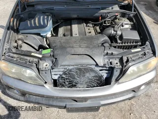 2006 BMW X5 3.0i with VIN 5UXFA13596LY39333, listed as a Copart auction lot 74065624 with 209,454 mi miles and Salvage Title. Bid and sale history available at carsss.com. Image 12.
