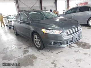 2015 Ford Fusion Energi Titanium with VIN 3FA6P0SU0FR253548, listed as a IAAI auction lot 41493710 with 172,417 mi miles. Bid and sale history available at carsss.com. Image 1.