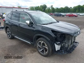 2023 Subaru Forester Touring with VIN JF2SKARC4PH485522, listed as a IAAI auction lot 42544425 with 38,872 mi miles and . Bid and sale history available at DreamBid. Image 1.