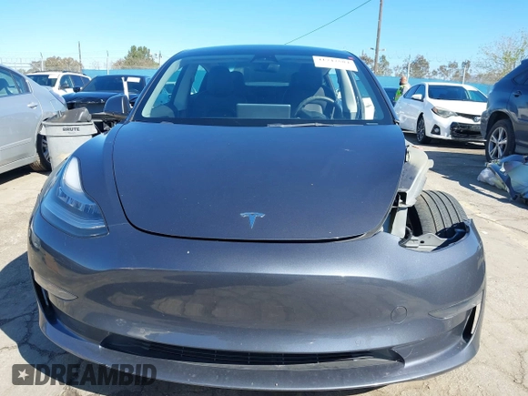 2022 Tesla Model 3 with VIN 5YJ3E1EA8NF241691, listed as a IAAI auction lot 41742584 with 70,375 mi miles and . Bid and sale history available at DreamBid. Image 12.