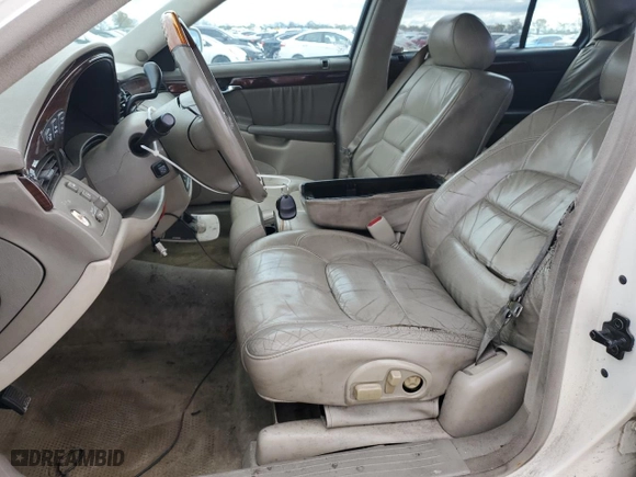 2003 Cadillac DeVille DHS with VIN 1G6KE57Y23U267952, listed as a Copart auction lot 80736904 with 216,825 mi miles and Clean Title. Bid and sale history available at carsss.com. Image 7.