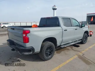 2024 Chevrolet Silverado 1500 LT Trail Boss with VIN 3GCUDFE83RG314063, listed as a IAAI auction lot 41824385 with 14,164 mi miles and . Bid and sale history available at DreamBid. Image 4.