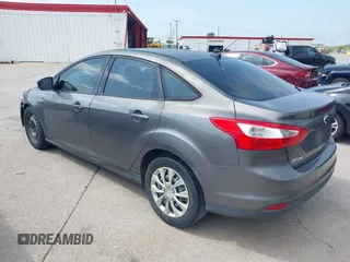 2012 Ford Focus SE z VIN 1FAHP3F24CL294391, wystawiony jako IAAI lot #42545359 z przebiegiem 190 904 mil mil oraz . Historia ofert i sprzedaży dostępna na DreamBid. Obrazek 3.