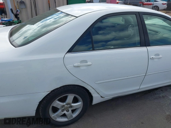 2002 Toyota Camry LE z VIN JTDBE32K020030113, wystawiony jako IAAI lot #41210452 z przebiegiem 190 486 mil mil oraz . Historia ofert i sprzedaży dostępna na DreamBid. Obrazek 6.