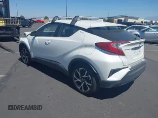 2019 Toyota C-HR XLE with VIN JTNKHMBX4K1040772, listed as a IAAI auction lot 41812031 with 79,729 mi miles. Bid and sale history available at carsss.com. Image 3.