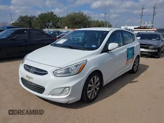 2015 Hyundai Accent Sport with VIN KMHCU5AE5FU201477, listed as a IAAI auction lot 41529347 with 189,774 mi miles. Bid and sale history available at carsss.com. Image 2.