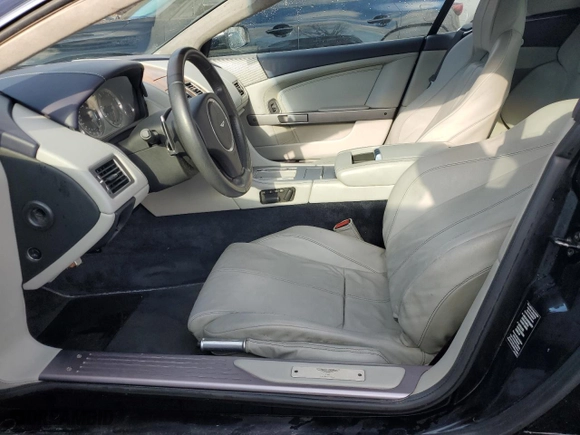2009 Aston Martin DB9 with VIN SCFAD02E79GB10991, listed as a Copart auction lot 85487894 with 0 mi miles and Salvage Title. Bid and sale history available at carsss.com. Image 7.