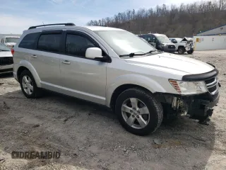 2012 Dodge Journey SXT с VIN 3C4PDDBG2CT323770, выставлен на аукционе Copart как лот 48722225 с пробегом 141 032 миль миль и Списание • Salvage title. История ставок и продаж доступна на DreamBid. Изображение 4.