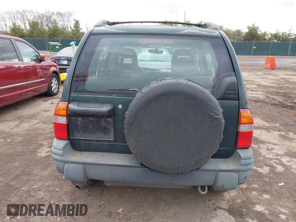 2002 Chevrolet Tracker z VIN 2CNBJ13C126946857, wystawiony jako IAAI lot #41491975 z przebiegiem Nie podano mil oraz . Historia ofert i sprzedaży dostępna na DreamBid. Obrazek 17.
