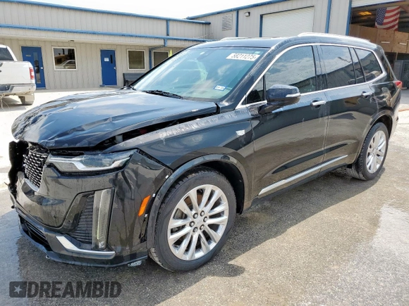 2020 Cadillac XT6 FWD Premium Luxury с VIN 1GYKPCRSXLZ104502, выставлен на аукционе Copart как лот 58211275 с пробегом 97 053 миль миль и Списание • Salvage title. История ставок и продаж доступна на DreamBid. Изображение 1.