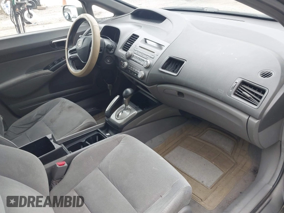 2006 Honda Civic LX z VIN 1HGFA16506L056545, wystawiony jako IAAI lot #42323282 z przebiegiem 273 962 mil mil oraz . Historia ofert i sprzedaży dostępna na DreamBid. Obrazek 5.