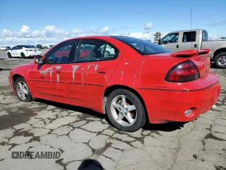 1999 Pontiac Grand Am GT1 with VIN 1G2NW52E5XM768638, listed as a Copart auction lot 49077115 with 113,018 mi miles and Salvage Title. Bid and sale history available at carsss.com. Image 2.
