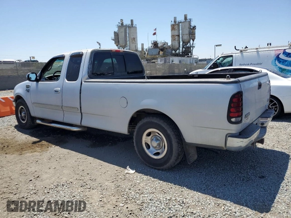 2001 Ford F-150 XL with VIN 1FTRX17W11NA24623, listed as a Copart auction lot 56767345 with 201,959 mi miles and Salvage title. Bid and sale history available at DreamBid. Image 2.