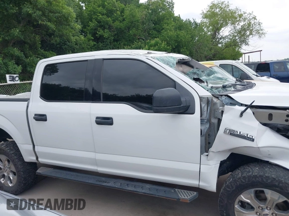 2016 Ford F-150 XLT with VIN 1FTEW1EF9GFA23176, listed as a IAAI auction lot 42142336 with 178,446 mi miles and . Bid and sale history available at carsss.com. Image 13.
