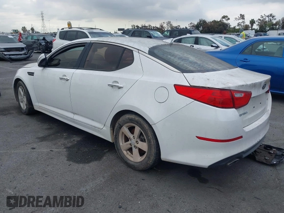 2015 Kia Optima LX with VIN KNAGM4A70F5644189, listed as a IAAI auction lot 42141090 with 140,346 mi miles. Bid and sale history available at carsss.com. Image 3.