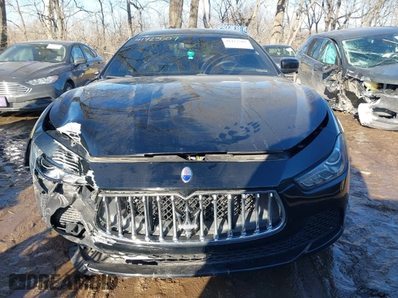 2014 Maserati Ghibli z VIN ZAM57XSA4E1090315, wystawiony jako IAAI lot #41423507 z przebiegiem 115 323 mil mil oraz . Historia ofert i sprzedaży dostępna na DreamBid. Obrazek 13.