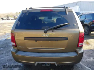 2009 Jeep Grand Cherokee Laredo with VIN 1J8GS48K79C516320, listed as a IAAI auction lot 41353131 with 166,739 mi miles. Bid and sale history available at carsss.com. Image 16.