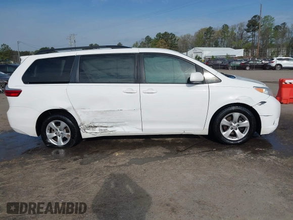 2015 Toyota Sienna LE AAS with VIN 5TDKK3DC2FS590667, listed as a IAAI auction lot 41997673 with 169,828 mi miles. Bid and sale history available at carsss.com. Image 13.