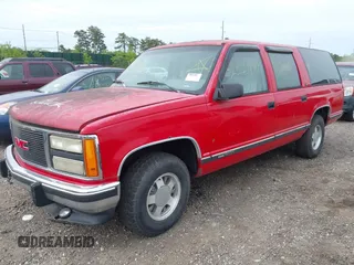 1992 GMC Suburban z VIN 1GKEC16K9NJ722021, wystawiony jako IAAI lot #42255371 z przebiegiem 180 966 mil mil oraz . Historia ofert i sprzedaży dostępna na DreamBid. Obrazek 2.