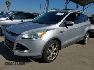 2015 Ford Escape Titanium with VIN 1FMCU0J90FUA43720, listed as a IAAI auction lot 42541048 with 98,948 mi miles and . Bid and sale history available at DreamBid. Image 17.