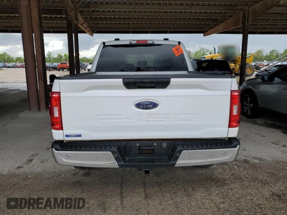 2023 Ford F-150 XL with VIN 1FTFW1E59PKE35312, listed as a Copart auction lot 50796195 with 19,849 mi miles and Salvage Title. Bid and sale history available at carsss.com. Image 6.