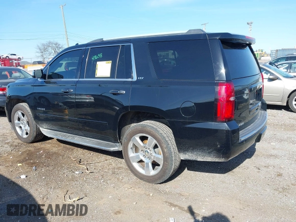 2016 Chevrolet Tahoe LTZ with VIN 1GNSCCKC2GR126687, listed as a IAAI auction lot 41952725 with 202,016 mi miles and . Bid and sale history available at DreamBid. Image 14.