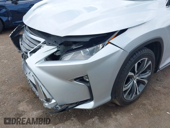 2017 Lexus RX 350 z VIN 2T2BZMCA9HC124727, wystawiony jako IAAI lot #42580173 z przebiegiem 106 749 mil mil oraz . Historia ofert i sprzedaży dostępna na DreamBid. Obrazek 6.
