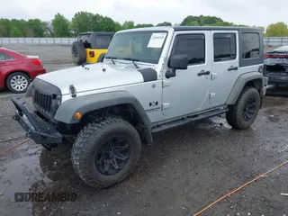 2007 Jeep Wrangler Unlimited X with VIN 1J4GA39187L209448, listed as a IAAI auction lot 42104328 with 138,302 mi miles and . Bid and sale history available at DreamBid. Image 2.