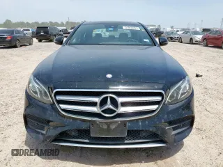 2017 Mercedes-Benz E 300 Luxury with VIN WDDZF4JB8HA123652, listed as a Copart auction lot 57050205 with 105,048 mi miles and Salvage title. Bid and sale history available at DreamBid. Image 5.