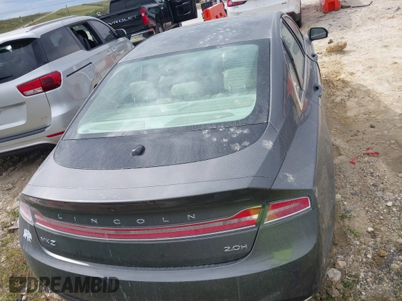 2014 Lincoln MKZ Hybrid with VIN 3LN6L2LU1ER814964, listed as a IAAI auction lot 40712613 with Not provided miles and . Bid and sale history available at DreamBid. Image 16.