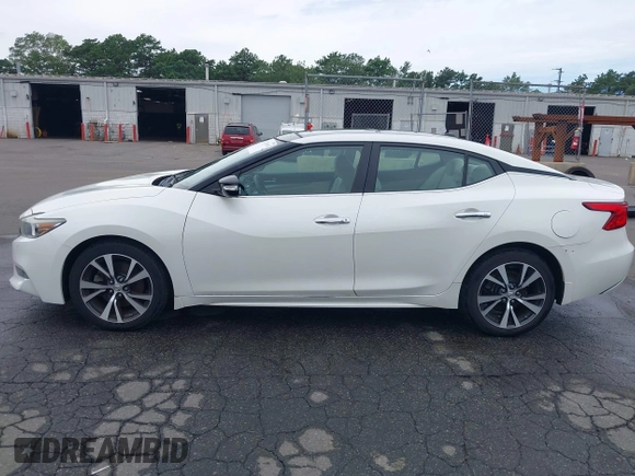 2016 Nissan Maxima Platinum with VIN 1N4AA6AP9GC403960, listed as a IAAI auction lot 42781654 with 19,699 mi miles and . Bid and sale history available at DreamBid. Image 14.