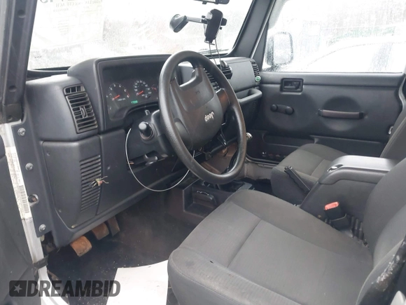 2006 Jeep Wrangler X with VIN 1J4FA39SX6P709588, listed as a IAAI auction lot 41927435 with 227,990 mi miles. Bid and sale history available at carsss.com. Image 5.