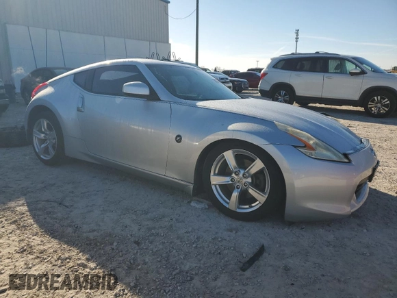2010 Nissan 370Z Touring with VIN JN1AZ4EH1AM504859, listed as a Copart auction lot 87377564 with 98,765 mi miles and Salvage Title. Bid and sale history available at carsss.com. Image 4.