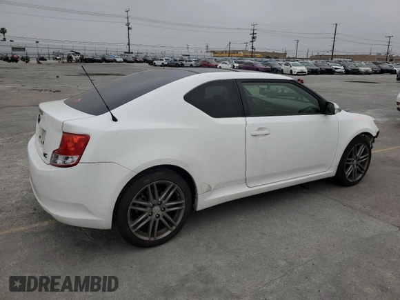 2013 Scion tC z VIN JTKJF5C77D3056779, wystawiony jako Copart lot #57459935 z przebiegiem 157 420 mil mil oraz Szkoda całkowita • Salvage title. Historia ofert i sprzedaży dostępna na DreamBid. Obrazek 3.