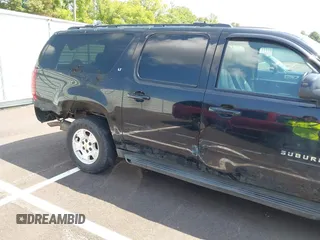 2011 Chevrolet Suburban LT with VIN 1GNSKJE34BR151246, listed as a IAAI auction lot 42520210 with 239,240 mi miles and . Bid and sale history available at DreamBid. Image 4.
