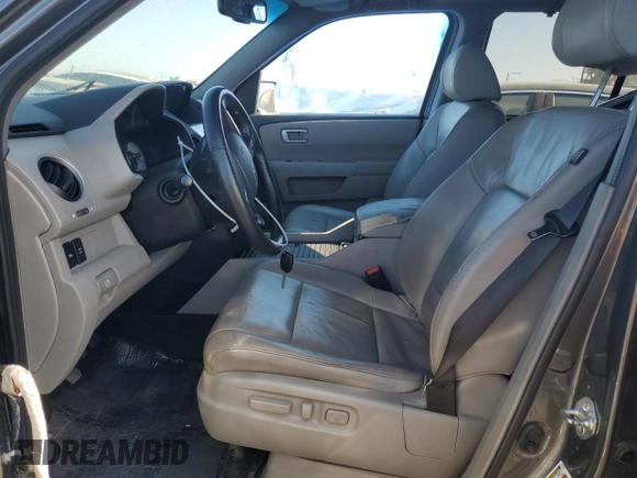 2011 Honda Pilot Touring z VIN 5FNYF4H94BB046303, wystawiony jako Copart lot #58017515 z przebiegiem 118 384 mil mil oraz Szkoda całkowita • Salvage title. Historia ofert i sprzedaży dostępna na DreamBid. Obrazek 7.