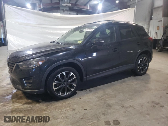 2016 Mazda CX-5 Grand Touring with VIN JM3KE4DY6G0655802, listed as a Copart auction lot 43820475 with 76,639 mi miles and Salvage Title. Bid and sale history available at carsss.com. Image 1.