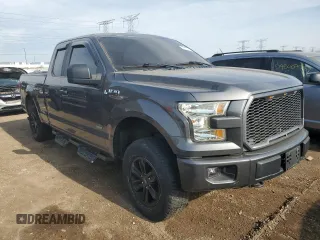 2015 Ford F-150 XLT with VIN 1FTEX1EP1FKE99188, listed as a Copart auction lot 54117115 with 201,077 mi miles and Salvage title. Bid and sale history available at DreamBid. Image 4.