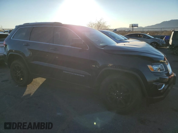 2016 Jeep Grand Cherokee Laredo z VIN 1C4RJFAG5GC463828, wystawiony jako Copart lot #89326575 z przebiegiem 74 669 mil mil oraz Szkoda całkowita • Salvage title. Historia ofert i sprzedaży dostępna na DreamBid. Obrazek 4.
