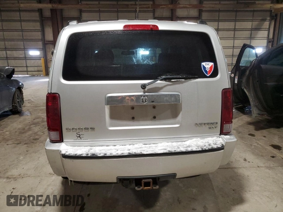 2010 Dodge Nitro SXT z VIN 1D4PU5GK7AW112562, wystawiony jako Copart lot #45113225 z przebiegiem 150 183 mil mil oraz Szkoda całkowita • Salvage title. Historia ofert i sprzedaży dostępna na DreamBid. Obrazek 6.