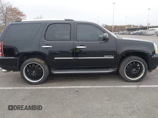 2012 GMC Yukon Denali with VIN 1GKS2EEF5CR129160, listed as a IAAI auction lot 42012417 with 221,871 mi miles. Bid and sale history available at carsss.com. Image 13.