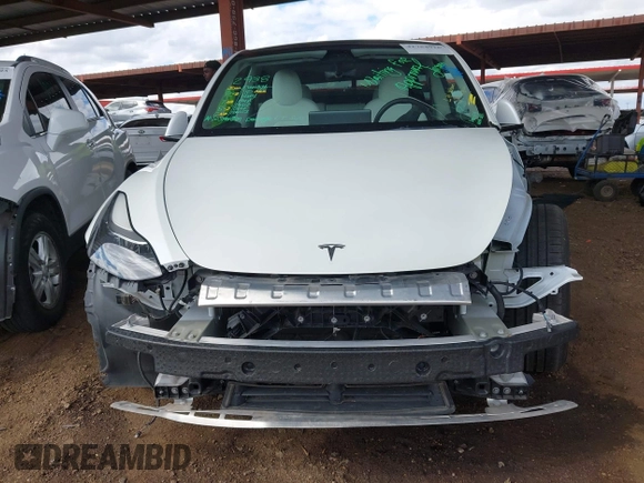 2022 Tesla Model Y Performance with VIN 7SAYGDEF4NF449986, listed as a IAAI auction lot 41754916 with 64,384 mi miles and . Bid and sale history available at DreamBid. Image 6.