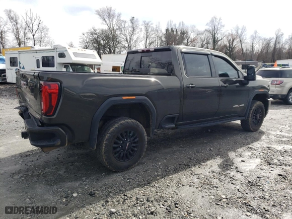 2023 GMC Sierra 2500HD AT4 with VIN 1GT49PE70PF187396, listed as a Copart auction lot 43544445 with 27,432 mi miles and Salvage Title. Bid and sale history available at carsss.com. Image 3.