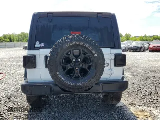 2021 Jeep Wrangler Unlimited Willys with VIN 1C4HJXDG3MW752441, listed as a Copart auction lot 55881925 with 61,751 mi miles and Salvage title. Bid and sale history available at DreamBid. Image 6.
